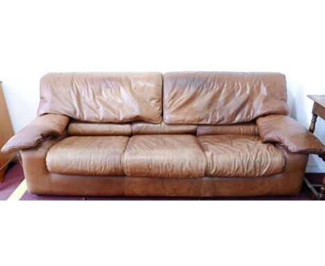 A 1970's Roche Bobois brown leather three seat sofa 