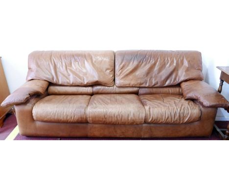 A 1970's Roche Bobois brown leather three seat sofa 