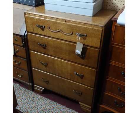An Art Deco oak chest of four drawers, raised on bracket feet, H.100 W.76 D.46cm 