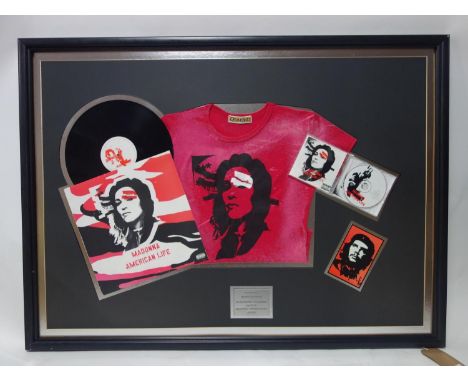 A framed Madonna record, cd and t-shirt by Warner Bros to regonise the collective sales, 76 x 110cm 