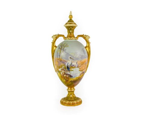 A Royal Worcester Porcelain Vase and Cover, by Walter Powell, 1912, of baluster form, the twin handles with lion masks, paint