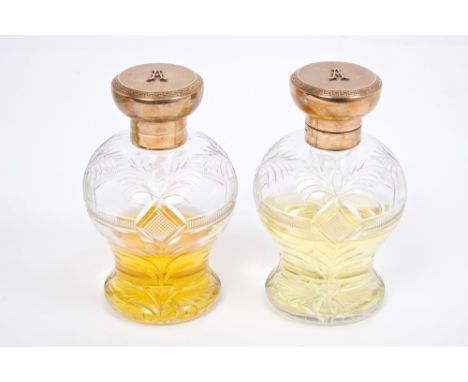 Pair fine quality gold mounted cut glass scent bottles, the baluster-shape cut glass body with hinged gold (9ct) lids applied