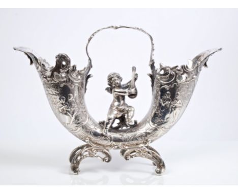 Early 20th century Continental silver flower vase in the form of a double cornucupia, embossed with shell and scroll decorati