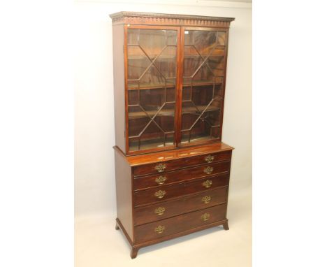 George III mahogany secretaire bookcase, the top with dentil and pendant-moulded cornice and adjustable shelves enclosed by p