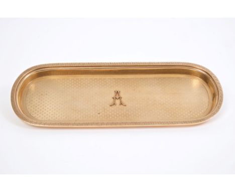 Fine quality gold (9ct) tray of oval form, applied with the initial 'A' against engine-turned decoration, the raised edge wit