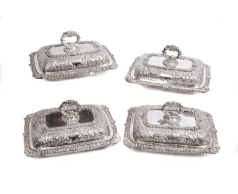 Exceptionally fine quality set of four George IV Irish silver double entrée dishes of rectangular form, with cast floral deco