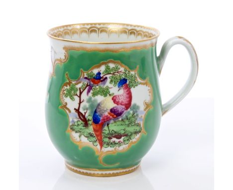 18th century Worcester baluster-shaped mug with polychrome exotic bird reserves on pale green and gilt ground, with ribbed lo