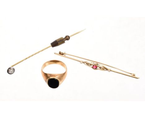 Edwardian diamond stick pin, Edwardian red stone and seed pearl bar brooch and a yellow metal and onyx signet ring (3)