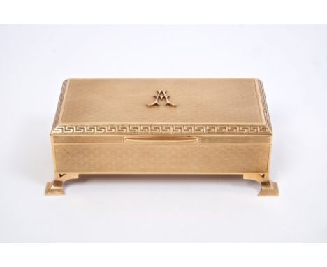 Fine quality gold (9ct) dressing table box of rectangular form, with engine-turned decoration and Greek key border, the hinge