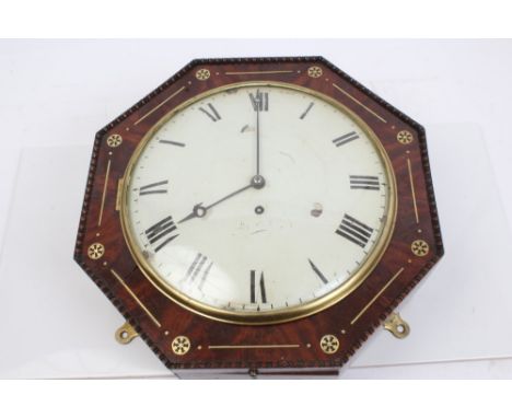 Victorian wall clock with eight day single fusee movement and white enamel dial with Roman numerals in an octagonal mahogany 
