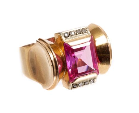 Art Deco 1940s diamond and pink stone dress ring of 'Odeonesque' design, the rectangular step cut pink stone flanked by rose 