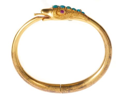 Good quality mid-19th century snake bangle, the chased gold snake's head with ruby eyes and graduated turquoise cabochons, th