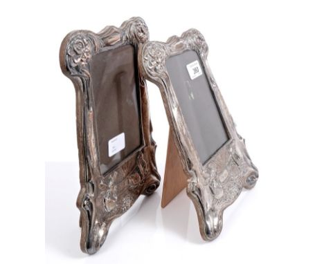 Pair late 19th / early 20th century silver plated photograph frames of shaped rectangular form, in the Art Nouveau style, wit