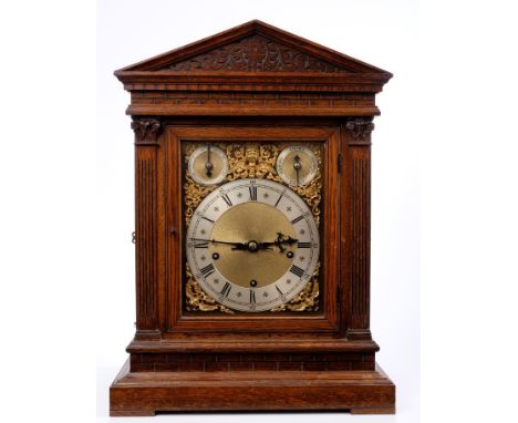 Victorian bracket clock with Westminster chiming movement and repeat, brass dial with angel face spandrels, silvered chapter 