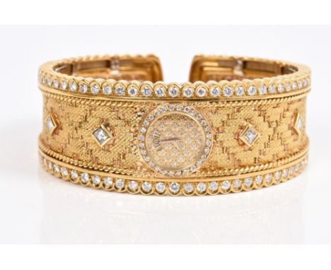 Fine Etoile gold (18ct) and diamond set bracelet watch, the wide hinged cuff with circular pavé set diamond dial with diamond