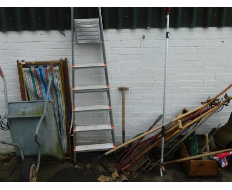 A wrought plant stand, two deck chairs, Titan ladder, various garden tools, wheelbarrow, etc. (a quantity) 