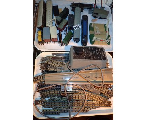 Two trays of Hornby Dublo train set including Sir Nigel Gresley engine mixed coaches and rolling stock and other accessories 