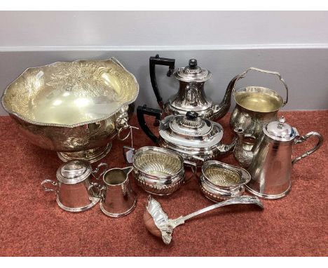 A W.MF.B Plated Three Piece Tea Set, each with vacant cartouches; together with a plated four piece tea set, of semi reeded f