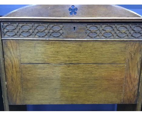OAK WRITING BUREAU, with hinged writing flap above two shelves 115cm high, 84cm wide, 24cm deep Ring mark to top, one side su