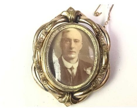 GILT METAL SWIVEL MOURNING BROOCH, ALONG WITH A FOB AND PROPELLING PENCIL the fob in yellow metal with spinning cut glass cit