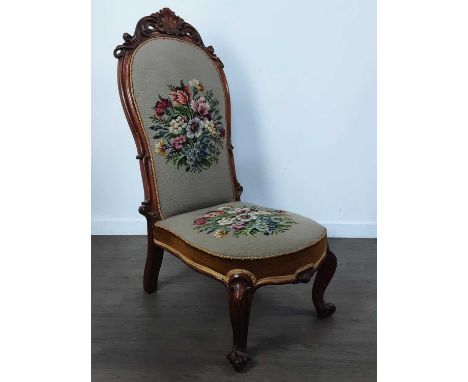 VICTORIAN WALNUT FRAMED NURSING CHAIR, LATE 19TH CENTURY on scrolled supports, with tapestry seat and back111.5cm high