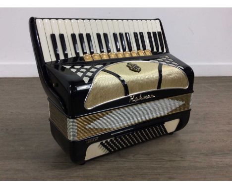 HOHNER LUCIA IV ACCORDION, in a black and cream colourway, in case44cm wide