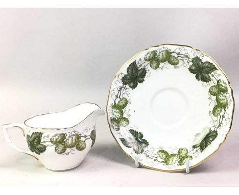 ROYAL WORCESTER TEA AND COFFEE SET, HOP MATHON PATTERN  comprising twelve cups and saucers, two sugar bowls, a milk jug, a cl