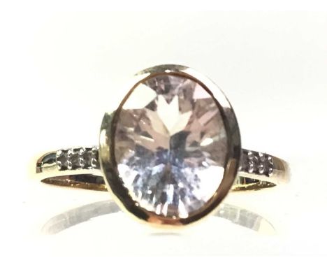 NINE CARAT GOLD RING, set with clear gem and diamondQty: 2g