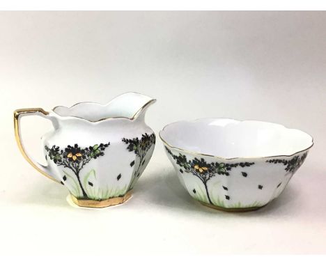 VICTORIA CHINA ART DECO TEA SERVICE, comprising ten cups, ten saucers, ten side plates, two biscuit plates, sugar and cream, 
