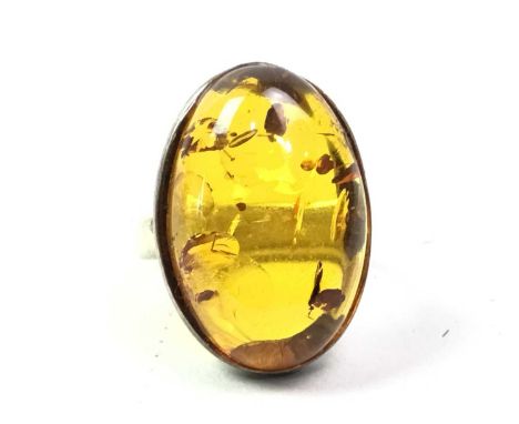NINE CARAT GOLD AMBER NECKLACE, along with an amethyst ring and two othersQty: 4