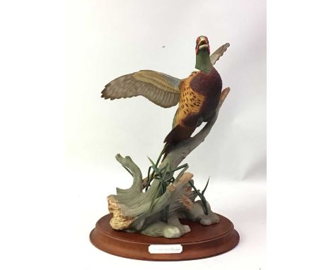 FIGURE OF 'THE RING NECKED PHEASANT, BY A,J, RUDISILL on wooden base, along with a Crown Staffordshire figurepheasant 33cm hi
