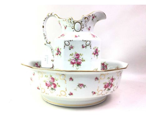 WASH BASIN AND EWER, EARLY 20TH CENTURY decorated with rose and gilt highlights on a white ground 32cm high overall