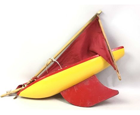 VINTAGE YACHT, AND A TABLE GLOBE painted in red and fellow, along with a globeyacht 36cm longQty: 2