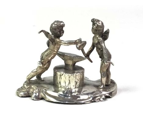 SILVER MINIATURE OF FIGURE GROUP, ALONG WITH TWO SPOONS A FORK A SHAKER AND A JAR the miniature group modelled as two cherubs