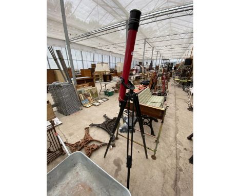 A TASCO TELESCOPE WITH TRIPOD BASE 