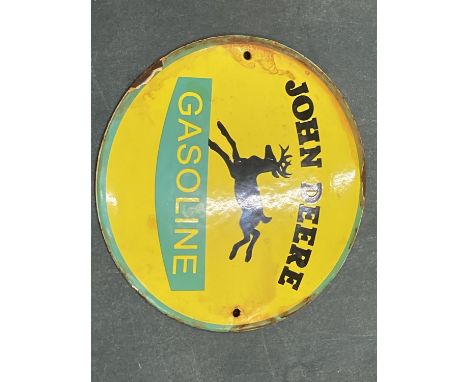 A SMALL JOHN DEERE ENAMEL SIGN, DIAMETER 15CM 