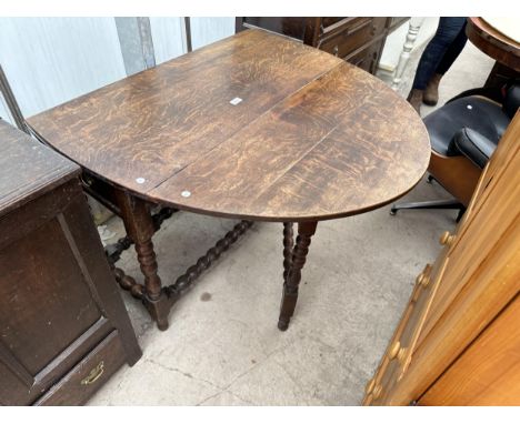 A GEORGE III OAK GATELEG DINING TABLE ON BOBBIN TURNED LEGS, WITH SINGLE DRAWER, 43.5X41" OPENED 
