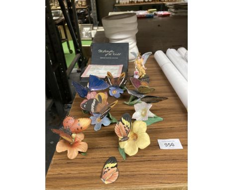 A COLLECTION OF BUTTERFLY FIGURES ON FLOWERS - TWO A/F, A DANBURY MINT ANGEL PLUS A BOOT PLANTER 