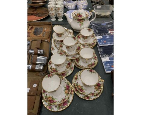 A ROYAL ALBERT 'OLD COUNTRY ROSES' TEASET TO INCLUDE A TEAPOT, CREAM JUG, SUGAR BOWL,SANDWICH AND CAKE TRAYS, CUPS, SAUCERS A