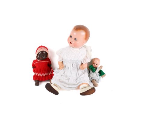 Four vintage German dolls. Comprising an Armand Marseille bisque doll with brown 'blinking' eyes and painted features, marked