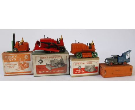 Four boxed diecast Dinky commercial vehicles
Comprising no.563 heavy tractor - orange, green wheels, darker green rubber trac