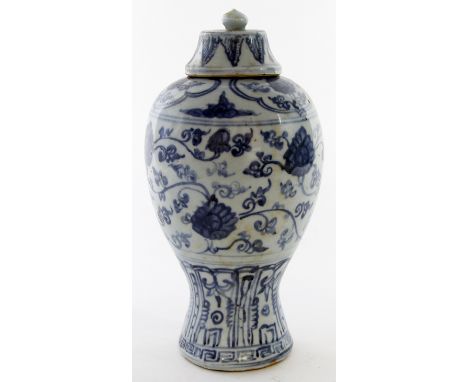 A Chinese provincial blue and white vase, 17th/18th Century 
Of meiping form, rising from a swept spreading circular base, ri