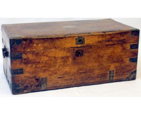 A 19th Century brass bound teak military trunk
The hinged lid with brass flush handle flanked on either side by hinged handle