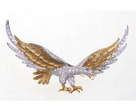 A fine quality diamond set brooch
In the form of a bird of prey with wings outstretched, abundantly parfait set with diamonds