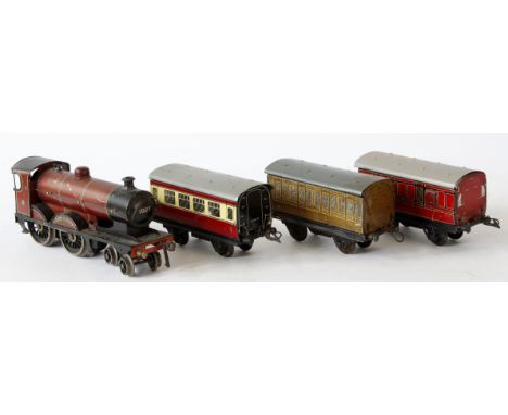 Four '0' gauge railways items
Comprising Bassett-Lowke 4-4-0 three-rail electric locomotive 'Duke of York', lacking tender, i