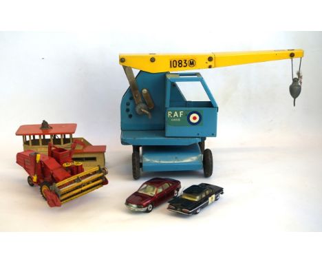 A collection of tinplate and diecast items
Comprising a Triang RAF crane, pale blue with yellow jib and approximately twenty 