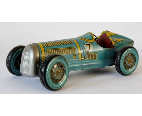 A Mettoy (UK) 'Giant' tinplate clockwork racing car
Impressive large scale example, 38cm long, light blue with yellow tin pri