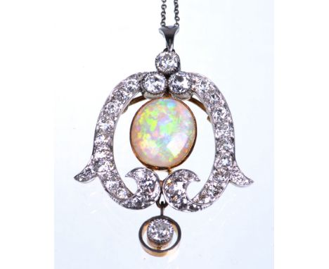 An exceptional Belle Epoque opal and diamond brooch/pendant circa 1900
The central oval cabochon opal of approx 15x13mm in a 