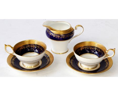An Aynsley bone china Georgian pattern 
Part tea service, on a cobalt ground, comprising milk jug, six cups, six saucers, six