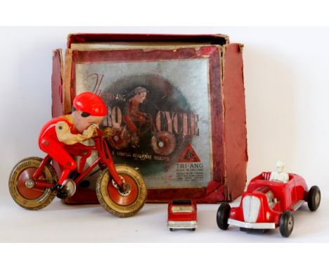 A boxed Triang Gyro cycle 
The cyclist in red clothing with red hat, also a red Marx Sparkling Hot Rod friction driven car no